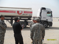 Scott and his students learning the ins and outs of fuel reciepts in Kuwait